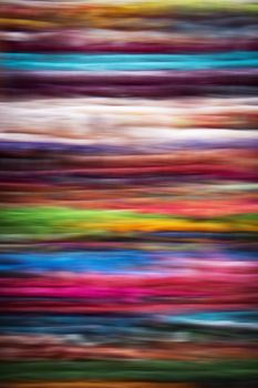 abstract background blurry colored threads on the carpet