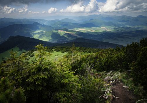 landscape View from the mountains to the sunny valley