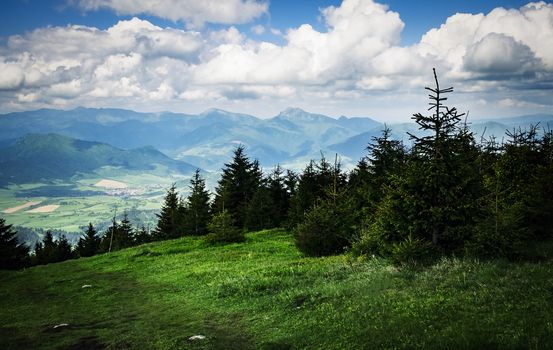 nature background View from the mountain meadow to the valley