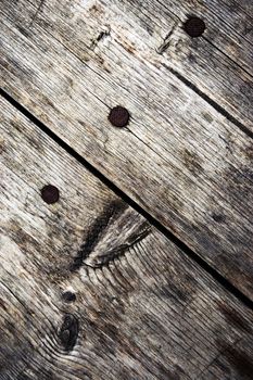 background or texture detail of old table with nails