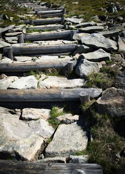 nlandscape background stone and wooden stairs in the mountains