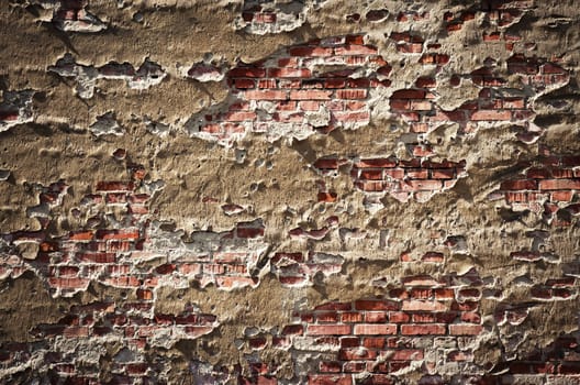 abstract background or texture old wall with fallen off plaster