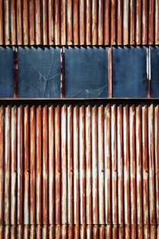 abstract background detail rusty metal wall with windows