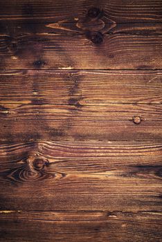 background or texture panel of brown stained spruce wood