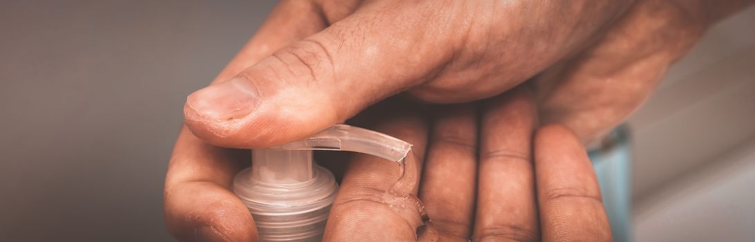 Man washing hands with soap and lathering suds. Protect against the coronavirus. Coronavirus pandemic protection by washing hands frequently. Hygiene to stop spreading coronavirus.