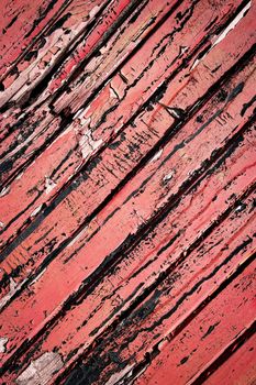 abstract background or texture red paint on old wooden slats