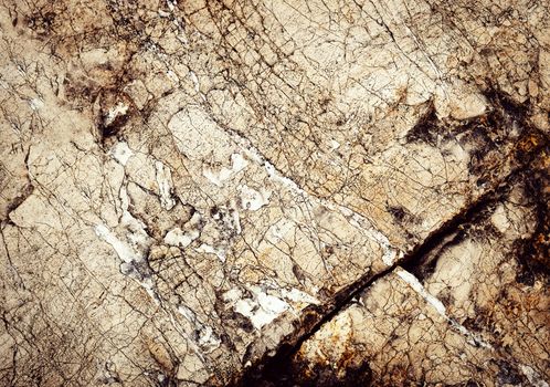 abstract background or texture old limestone surface with cracks
