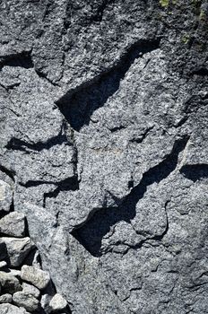 background or texture shadows on grey granite rock