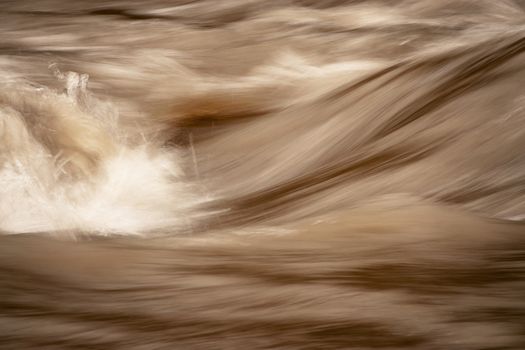 abstract seasonal background blurred muddy river
