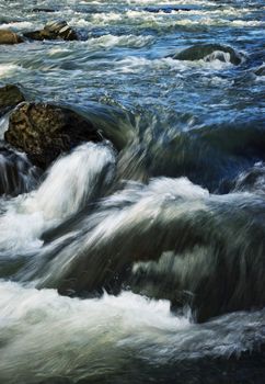 nature background the early evening river with rapids