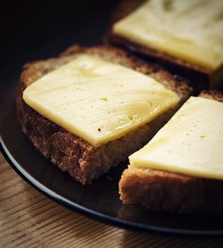food background toast with cheese on a plate detail