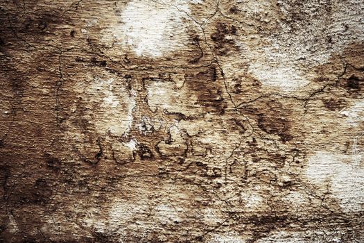 abstract background or texture dark plaster sepia color with crack
