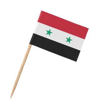 Small paper Syrian flag on wooden stick, isolated on white