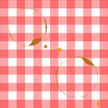 Two drinking cup stains on a gingham tablecloth.