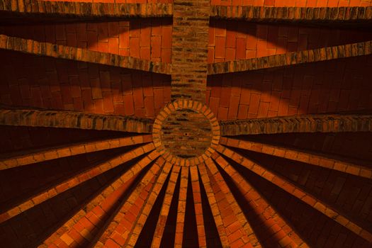 Santa Coloma de Cervello, Spain - 15 January 2019: Church of Colonia Guel interior ceiling close-up