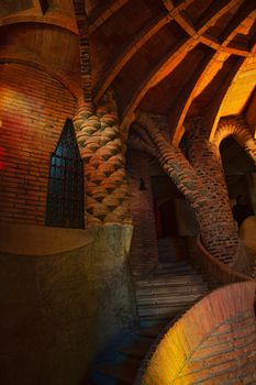 Santa Coloma de Cervello, Spain - 15 January 2019: Church of Colonia Guell interior stairs