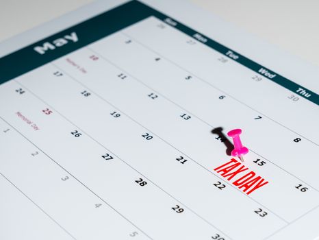 Reminder for sending income tax return for May 15 2020 tax day due to Covid-19 virus delay using calendar page and pin