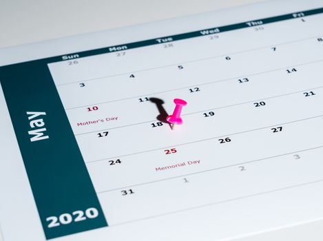 Reminder for sending income tax return for May 18 2020 tax day due to Covid-19 virus delay using calendar page and pin