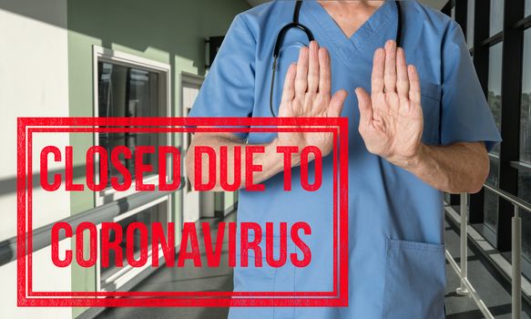 Doctor in scrubs refusing entry to patient to hospital due to no coronavirus ventilator critical care beds available