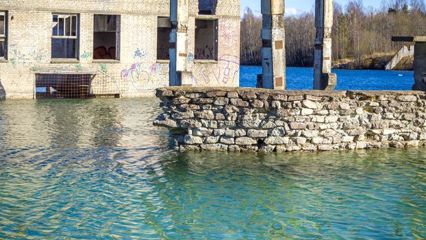 Abstract Water surface of a lake. Abandoned Quarry Of Rummu, Estonia. Panoramic View. Copy space. Quarry Of Rummu. Estonia