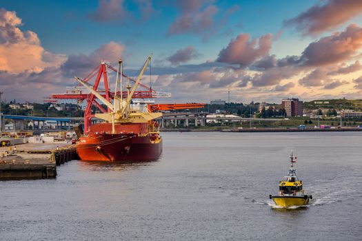 Heavy red tanker at port in Saint John, New Brunswick, Canada