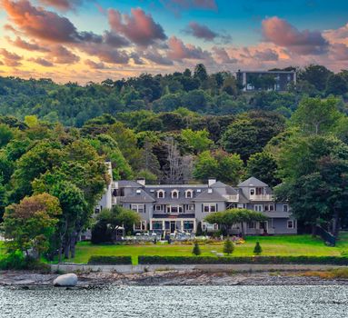 Old gray wood inn on the coast of Maine near Bar Harbor