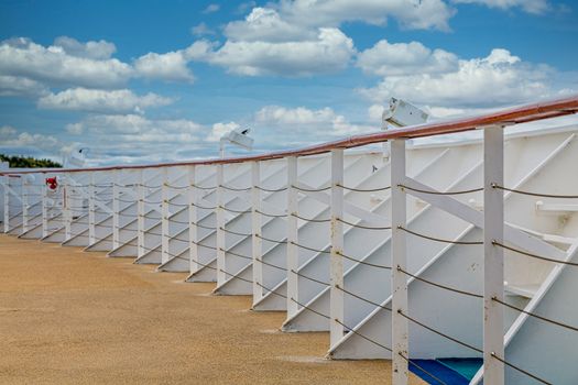 White metal bulkhead and railing at bow of cruise ship