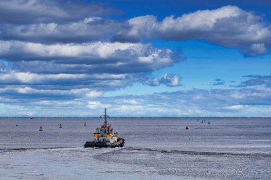 A tugboat heading out to sea from Saint John, New Brunswick, Canada