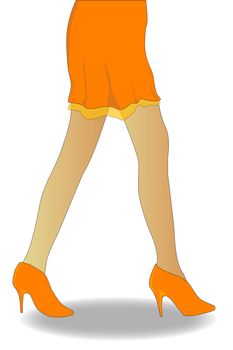 A womens legs in an orange skirt and high heals.