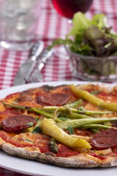 pizza with asparagus and salami