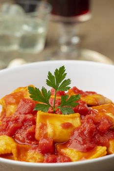 ravioli with tomato sauce on a plate