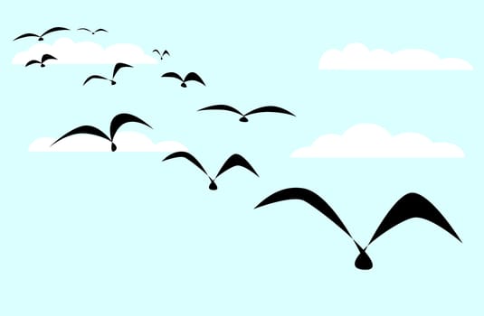 A flock of black birds set against a blue sky