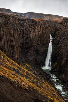 Hengifoss and litlanesfoss waterfalls in eastside of Iceland in a cloudy day