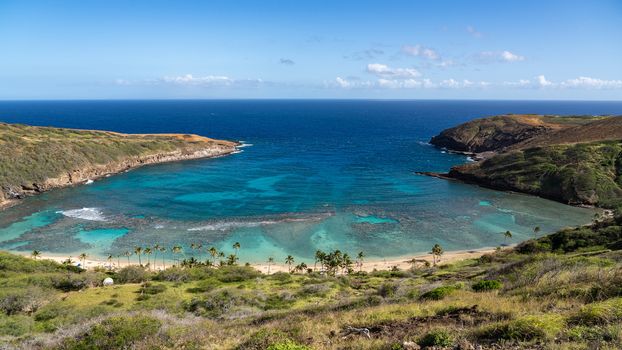 Panoramic view of the clear water of Hanauma Bay nature preserve near Waikiki on Oahu, Hawaii