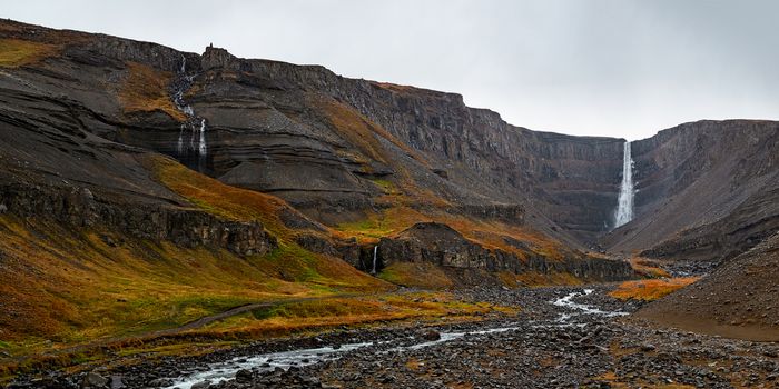 Hengifoss waterfall in eastside of Iceland in a cloudy day