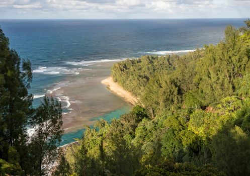 Aerial view down onto Ke'e beach from Kalalau trail on Na Pali coast of Kauai