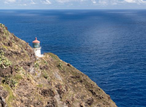 Old lighthouse on the cliff side on Makapu'u point on Oahu in Hawaii