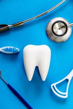 Dental model and dental equipment on blue background, concept image of dental background. dental hygiene background