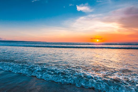 Amazing sunset from Bali Double Six beach surf waves and colorful clouds