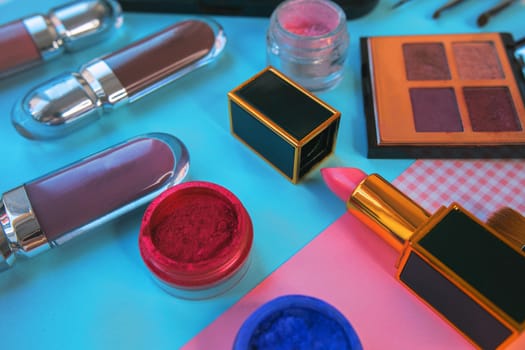 Set of decorative cosmetics on color background