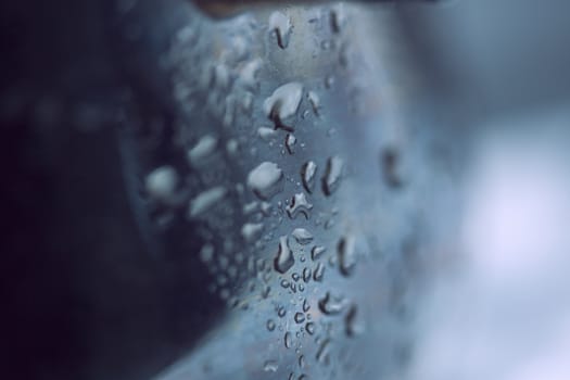 beads of water on a black background