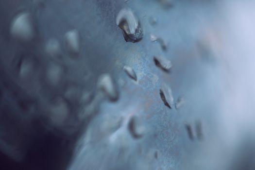 beads of water on a black background