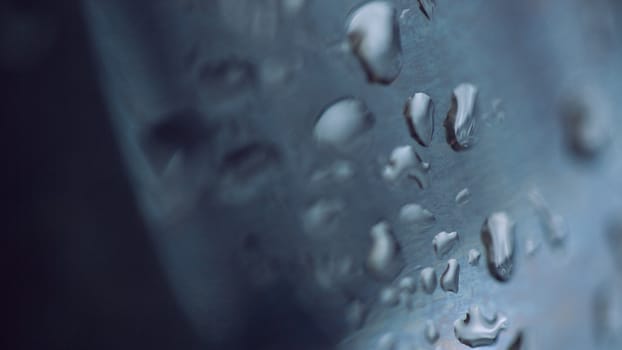 beads of water on a black background