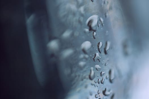 beads of water on a black background