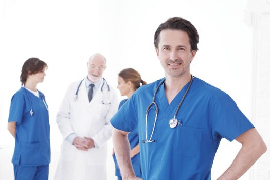 Group of happy successful colleagues doctors studio isolated on white background