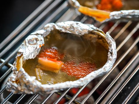 Zuwai Kani Miso Japanese Cuisine Buffet. Crab cooked in the shell with plenty of seasoning over an open flame.