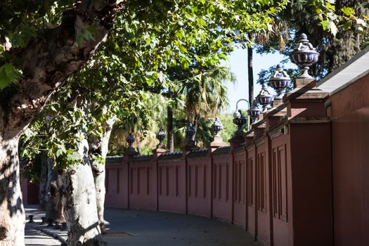 Seville, Spain - 29 July 2013: Elegant wall with vases around Palace of San Telmo on Palos de la Fronter street