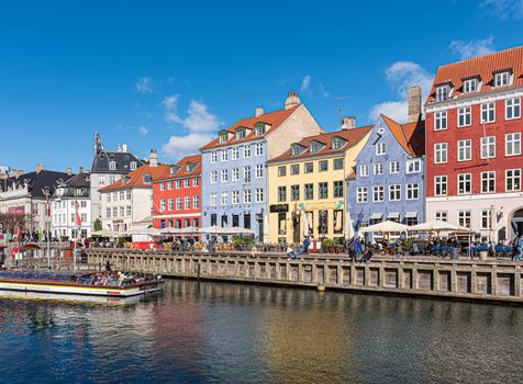 Landscape of the ancient port of Nyhavn in Copenhagen in Denmark, channel European tourist destination