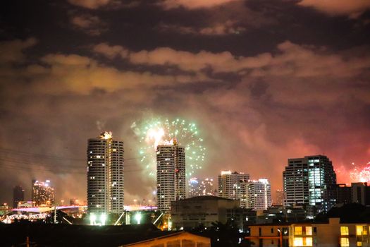 New Year fireworks in Bangkok. Beautiful night panorama. Celebrating festive saluteNew Year fireworks in Bangkok. Beautiful night panorama. Celebrating festive salute