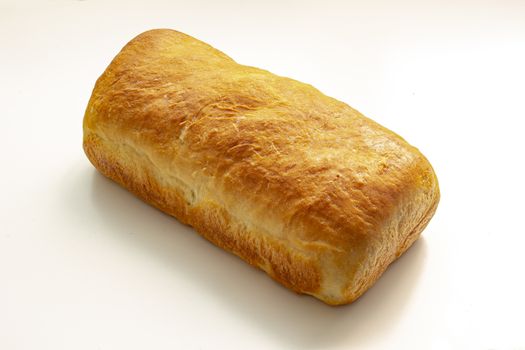 An isolated homemade white bread on a white background